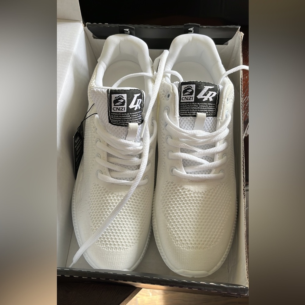 Men's size 10 brand new in box sneakers.